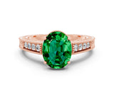 Rose gold Oval Cut Emerald Engagement Ring with Milgrain Channel Set Band and Prong Setting