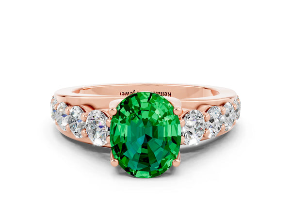 Rose gold Oval Cut Emerald Engagement Ring with Pavé Band and Four-Prong Setting