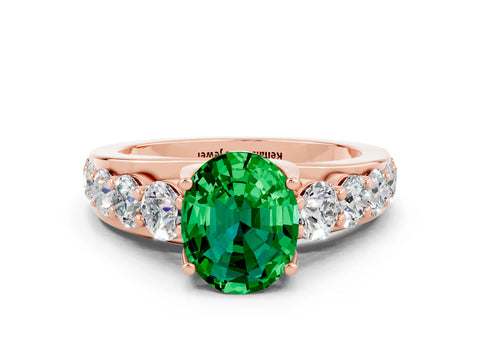 Rose gold Oval Cut Emerald Engagement Ring with Pavé Band and Four-Prong Setting