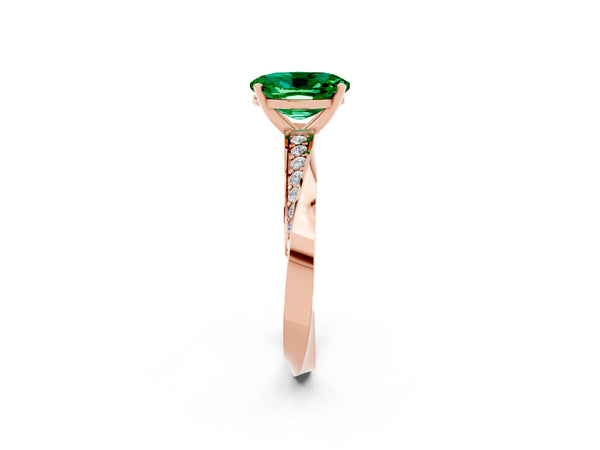 Rose gold Oval Cut Emerald Engagement Ring with Side Stone Accents and Four-Prong Setting