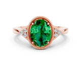Rose gold Oval Cut Emerald Halo Ring with Tapered Band and Four-Prong Setting