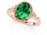 Rose gold Oval Cut Emerald Halo Ring with Tapered Band and Four-Prong Setting_1