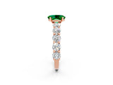 Rose gold Oval Cut Emerald Prong Setting with Side Stones on a Pave Band_2