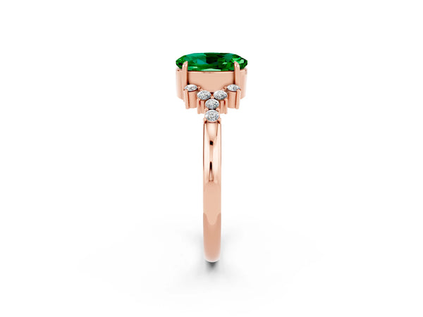Rose gold Oval Cut Emerald Ring with Side Stones and Four-Prong Setting