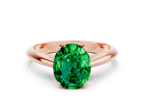 Rose gold Oval Cut Emerald Solitaire Engagement Ring with Cathedral Setting and Four-Prong Mount