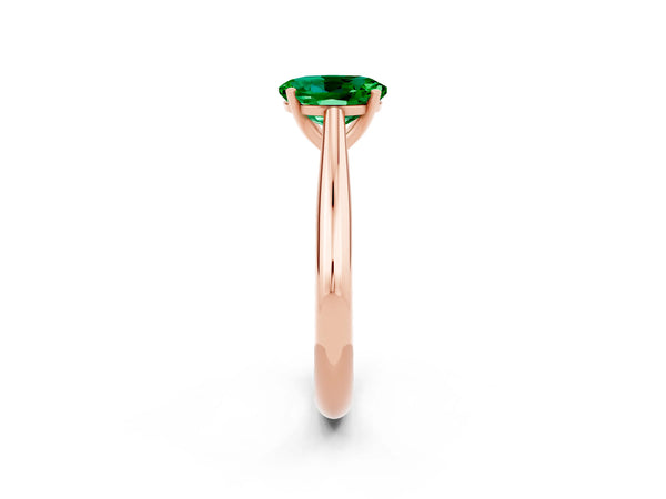 Rose gold Oval Cut Emerald Solitaire Engagement Ring with Cathedral Setting and Four-Prong Mount