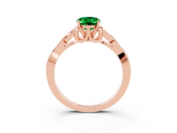 Rose gold Oval Cut Emerald Solitaire Engagement Ring with Celtic Knot Band and Four-Prong Setting