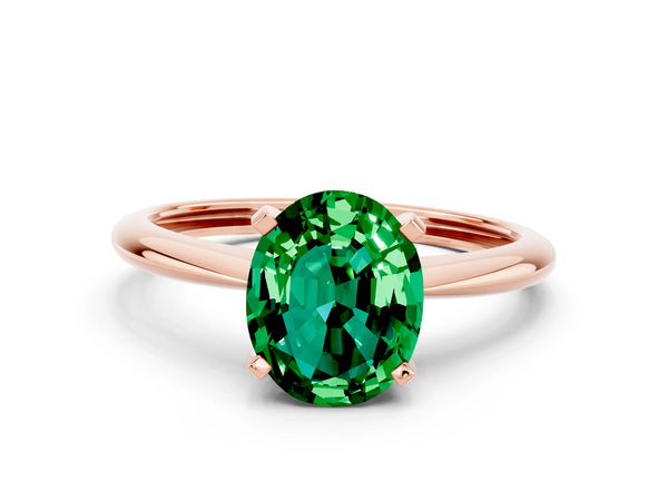 Rose gold Oval Cut Emerald Solitaire Engagement Ring with Classic Band and Four-Prong Setting