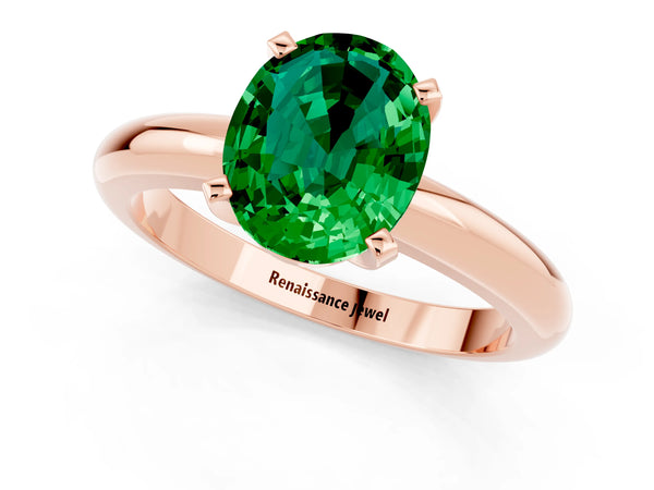 Rose gold Oval Cut Emerald Solitaire Engagement Ring with Round Band and Four-Prong Setting