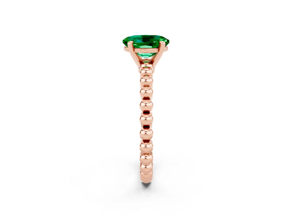 Rose gold Oval Cut Emerald Solitaire Ring with Beaded Band and Prong Setting
