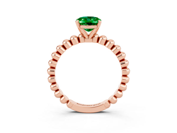 Rose gold Oval Cut Emerald Solitaire Ring with Beaded Band and Prong Setting