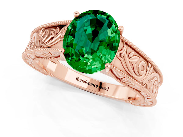 Rose gold Oval Cut Emerald Solitaire Ring with Engraved Band and Four-Prong Setting
