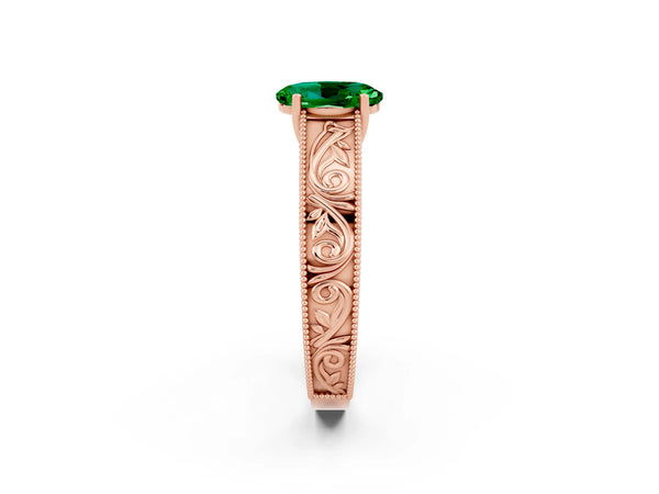Rose gold Oval Cut Emerald Solitaire Ring with Engraved Band and Four-Prong Setting