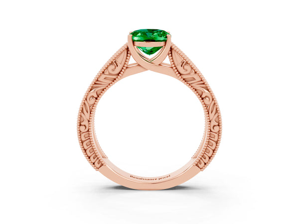 Rose gold Oval Cut Emerald Solitaire Ring with Engraved Band and Four-Prong Setting