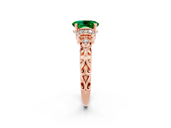 Rose gold Oval Cut Emerald Solitaire Ring with Filigree Band and Four-Prong Setting