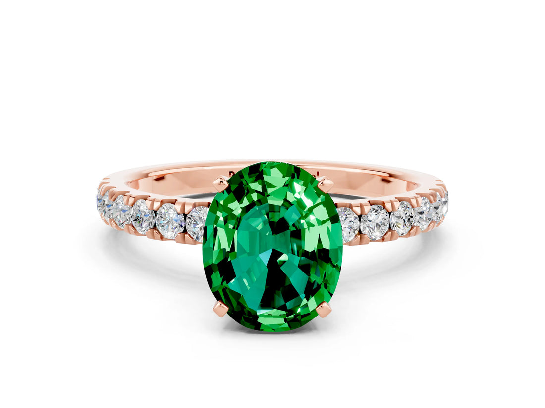 Rose gold Oval Cut Emerald Solitaire Ring with Pavé Accents and Four-Prong Setting