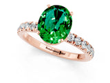Rose gold Oval Cut Emerald Solitaire Ring with Pavé Accents and Four-Prong Setting_1