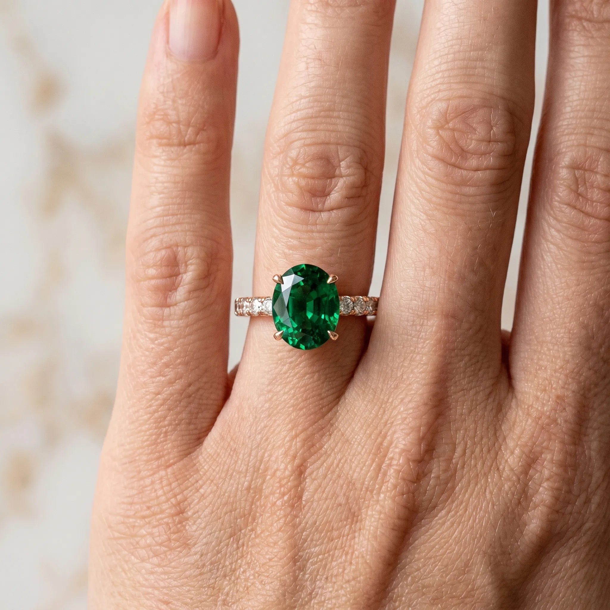 Rose gold Oval Cut Emerald Solitaire Ring with Round  Pavé Band and Four-Prong Setting_42