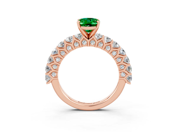 Rose gold Oval Cut Emerald Solitaire Ring with Shared Prong Pavé Band and Four-Prong Setting