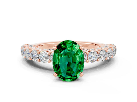 Rose gold Oval Cut Emerald Solitaire Ring with Shared Prong Pavé Band and Four-Prong Setting