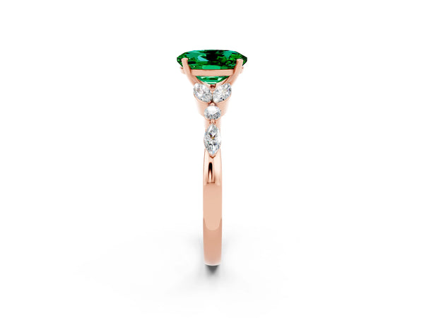 Rose gold Oval Cut Emerald Solitaire Ring with Side Stones and Four-Prong Setting