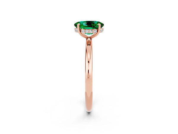 Rose gold Oval Cut Emerald Solitaire Ring with Thin Band and Four-Prong Setting