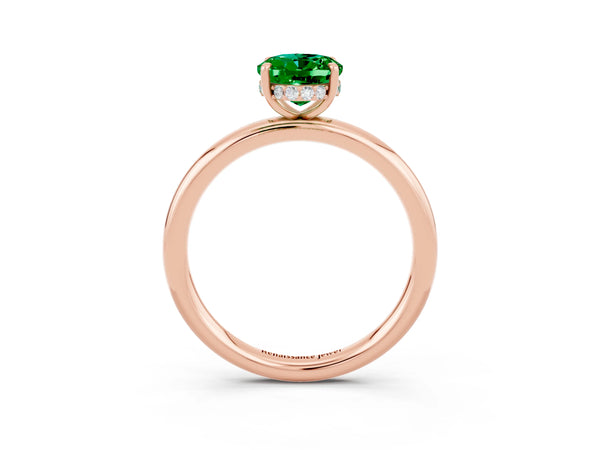 Rose gold Oval Cut Emerald Solitaire Ring with Thin Band and Four-Prong Setting