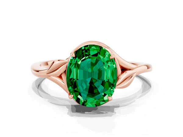 Rose gold Oval Cut Emerald Solitaire Ring with Twist Band and Four-Prong Setting