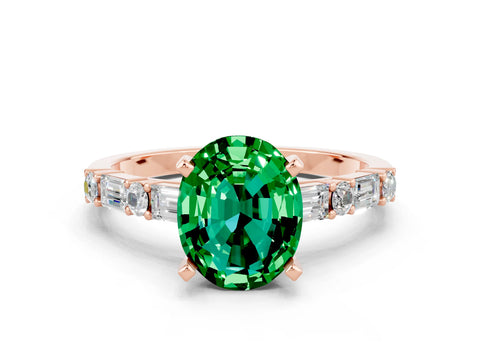 Rose gold Oval Cut Emerald Solitaire with Side Baguettes and Channel Set Band