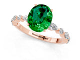 Rose gold Oval Cut Emerald Solitaire with Side Stones on a Pavé Band and Four-Prong Setting_1