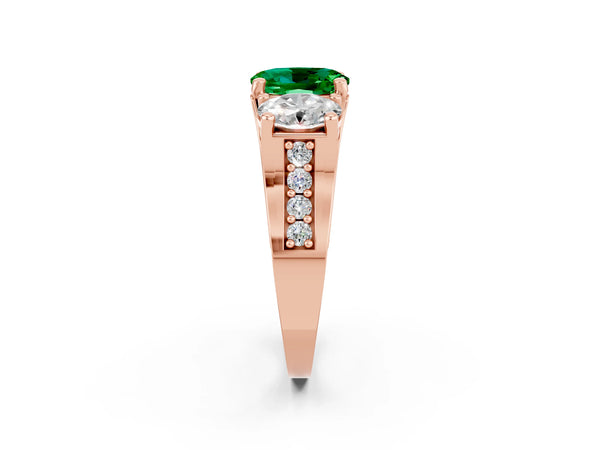 Rose gold Oval Cut Emerald Three-Stone Ring with Channel Set Band and Four-Prong Setting