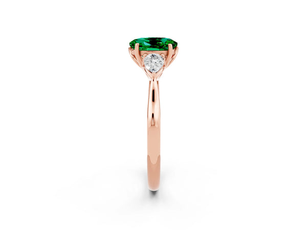 Rose gold Oval Cut Emerald Three-Stone Ring with Pear  Side Stones and Prong Setting