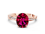 Rose gold Oval Cut Garnet Engagement Ring with Side Stone Accents and Four-Prong Setting_60