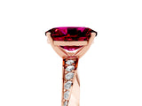 Rose gold Oval Cut Garnet Engagement Ring with Side Stone Accents and Four-Prong Setting_65