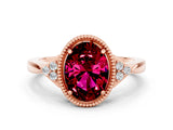Rose gold Oval Cut Garnet Halo Ring with Tapered Band and Four-Prong Setting
