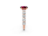 Rose gold Oval Cut Garnet Prong Setting with Side Stones on a Pave Band_2