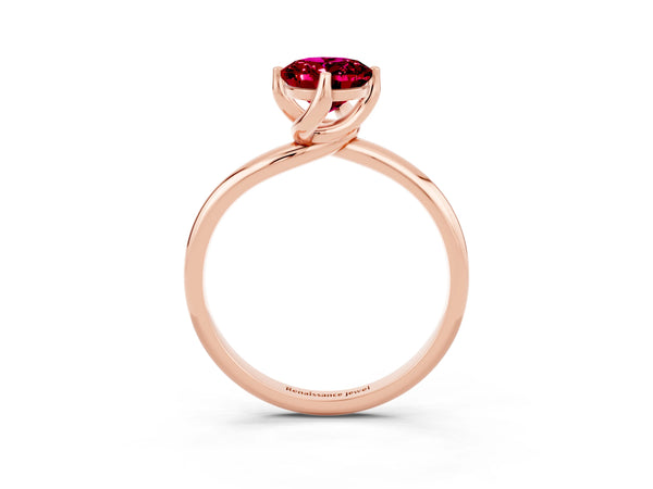 Rose gold Oval Cut Garnet Solitaire Engagement Ring with Four-Prong Setting and Classic Band