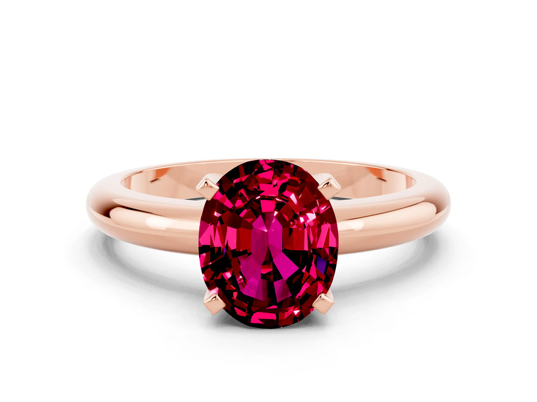 Rose gold Oval Cut Garnet Solitaire Engagement Ring with Round Band and Four-Prong Setting