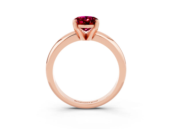 Rose gold Oval Cut Garnet Solitaire Engagement Ring with Round Band and Four-Prong Setting