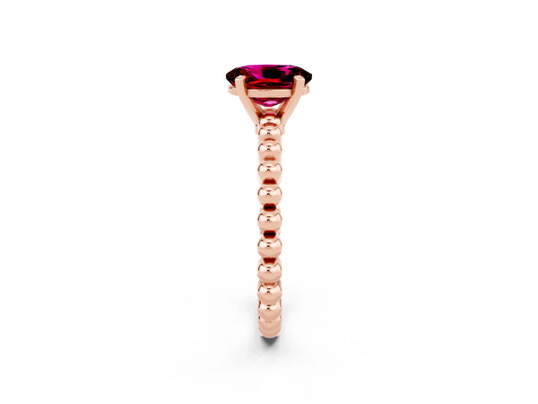 Rose gold Oval Cut Garnet Solitaire Ring with Beaded Band and Prong Setting