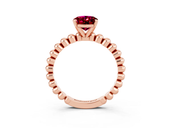 Rose gold Oval Cut Garnet Solitaire Ring with Beaded Band and Prong Setting