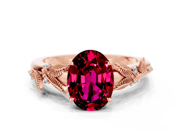 Rose gold Oval Cut Garnet Solitaire Ring with Leaf Motif Band and Four-Prong Setting