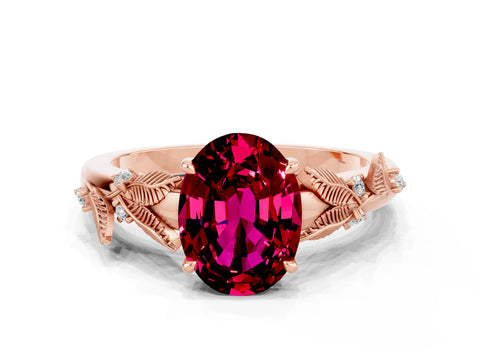 Rose gold Oval Cut Garnet Solitaire Ring with Leaf Motif Band and Four-Prong Setting