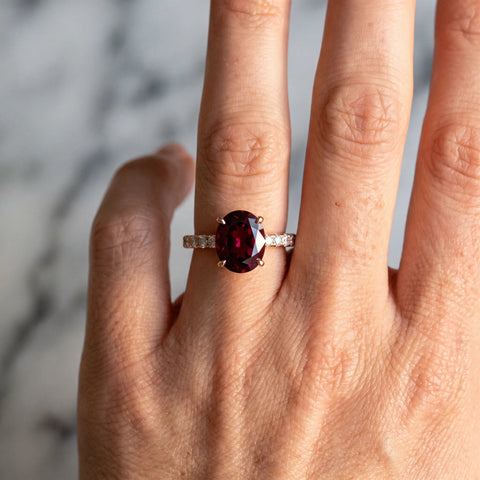 Rose gold Oval Cut Garnet Solitaire Ring with Round  Pavé Band and Four-Prong Setting_42
