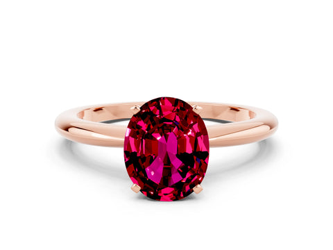 Rose gold Oval Cut Garnet Solitaire Ring with Six-Prong Setting and Classic Band