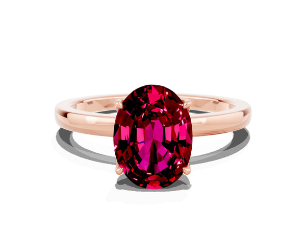 Rose gold Oval Cut Garnet Solitaire Ring with Thin Band and Prong Setting