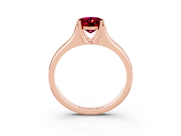 Rose gold Oval Cut Garnet Solitaire Ring with Wide Band and Prong Setting