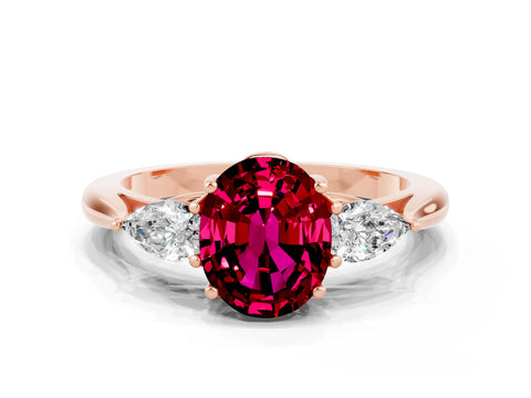 Rose gold Oval Cut Garnet Three-Stone Ring with Pear Side Stones and Four-Prong Setting_12