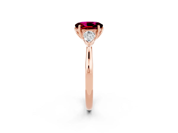 Rose gold Oval Cut Garnet Three-Stone Ring with Pear  Side Stones and Prong Setting