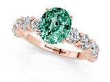 Rose gold Oval Cut Green Sapphire Prong Setting with Side Stones on a Pave Band_1